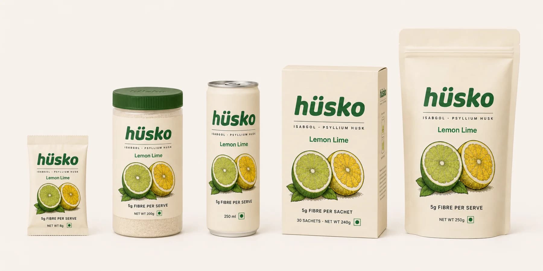 The five hüsko formats side by side in Lemon Lime: an 8 g sachet, a 200 g jar, a 250 ml can, a 30-sachet carton and a 250 g refill pouch